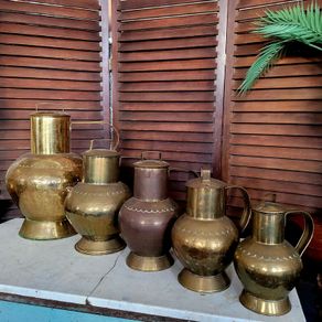 Antique brass & copper graduated collection of lidded dairy pitchers