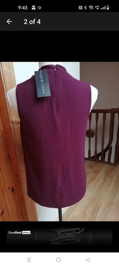 New look wine sleeveless top with choker neck. And zip opening at the back. size 8. Bust 18" length 24" New with tags