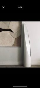 Vintage standing mirror with a classic white frame, in the style of Roger Lecal