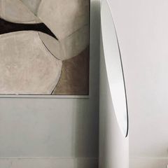 Vintage standing mirror with a classic white frame, in the style of Roger Lecal