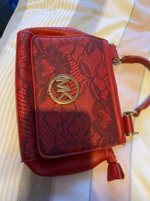 Red clutch bag