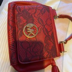 Red clutch bag