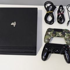 PS4 Pro 1TB + 2 Controllers + Charging Dock