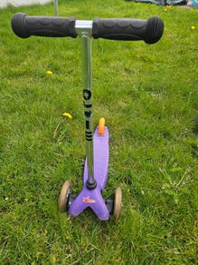 Purple micro scooter