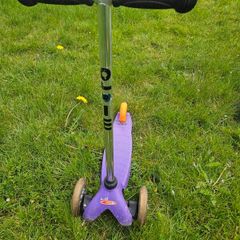 Purple micro scooter