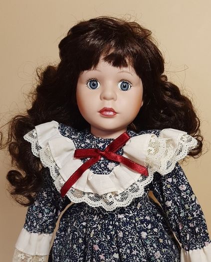 9 x  Porcelain dolls
