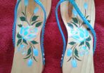 Blue Wooden flip flop.