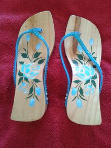 Blue Wooden flip flop.