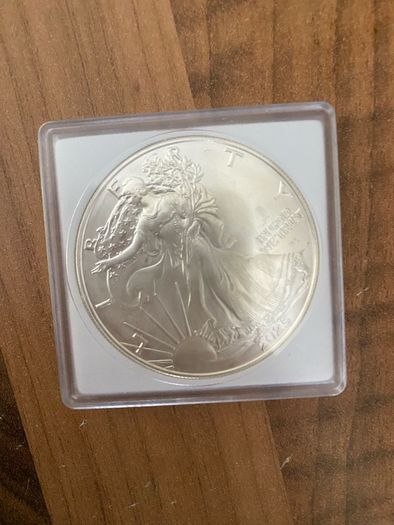 4 silver oz coins & 0.5g gold coin