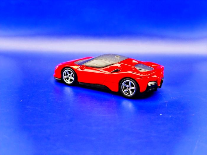Hot Wheels Ferrari SF90 Stradale with custom wheels.