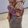 Vintage P. Maeder Lucerne Switzerland Wood Carving Of Woman  Holding Bundle Of Wood. Image 2