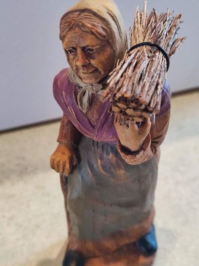 Vintage P. Maeder Lucerne Switzerland Wood Carving Of Woman  Holding Bundle Of Wood.