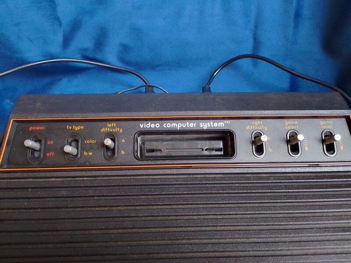 Atari 2600 'woody' console set with ganes