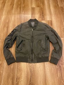 Old surplus khaki green bomber jacket