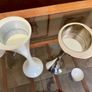 Vintage 20th Century Heavy Asymmetrical Stainless Steel and White Enamel Pair Of Candle Holders Image 6