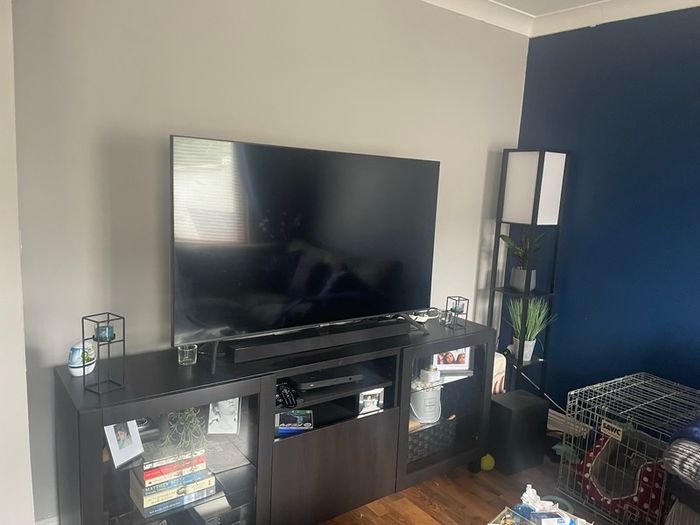 Dark wood effect TV unit