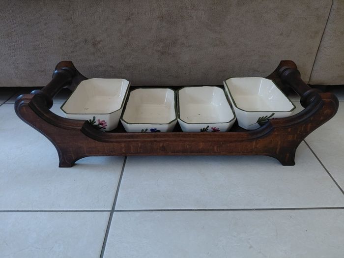 Vintage wooden serving tray with four ramekins