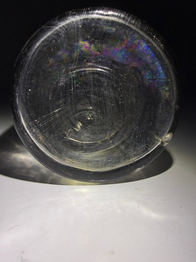 Old clear small glass jar