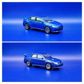 Realtoy Subaru Impreza and Mitsubishi Lancer, used, near mint condition.