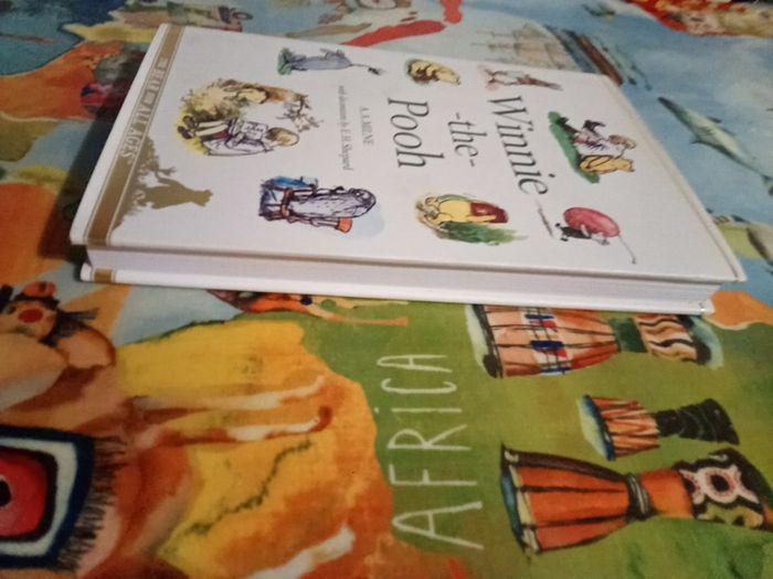 Winnie the Pooh by A A Milne with decorations by E H Shepard