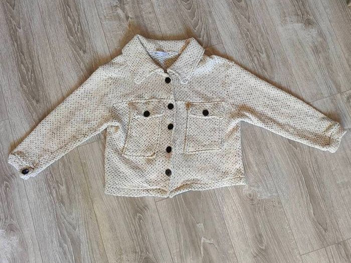 Beige jacket, size 10