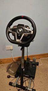 Thrustmaster T248 Racing Wheel and T3PM Pedal Set, complete with a sturdy folding metal wheel stand.