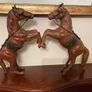 Pair of Antique leather horses Image 2