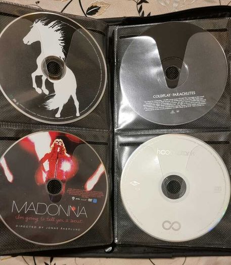 80 CD + Case. All CD's in perfect playable condition.