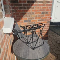 Carrier for bicycle with rear suspension