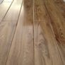 New 12mm High Gloss Calgary Walnut Image 3