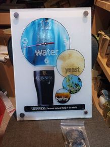 Guinness battery clock