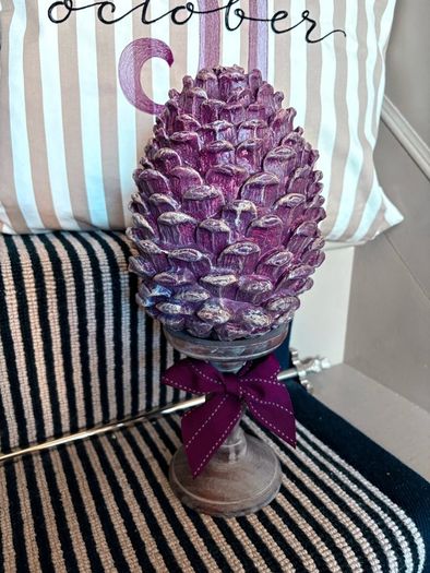 New bespoke oversized autumn Pinecone on distressed wood base in mulberry