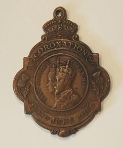 1911 bronze medal. King George V and Queen Mary