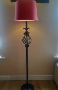 Black with gold detail compleate with shade plus have an  extra grey shade 135cm high