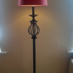 Black with gold detail compleate with shade plus have an  extra grey shade 135cm high