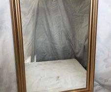 Mirror with frame in antique gold