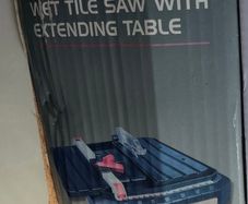Wet Tile Saw and extendable table, and case of tools for measuring and cutting tiles
