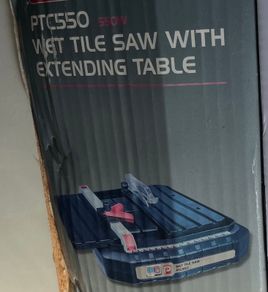 Wet Tile Saw and extendable table, and case of tools for measuring and cutting tiles