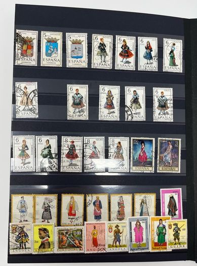 Ace Black 32 page/ 16 leaf Stamp Album with over 900 stamps. Thematic of Animals, Plants, Classic Cars, Space, Trains, Sport & Disney noted.