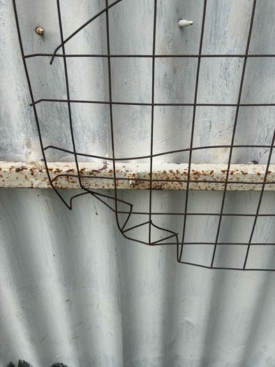 6 wire plant holders and 2 lawn plant protectors