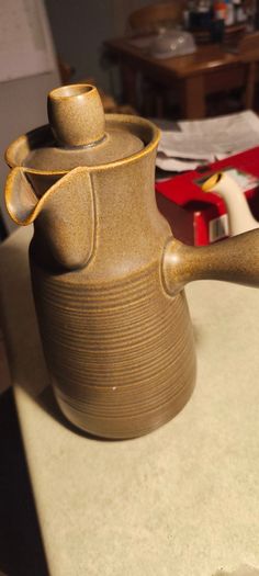2 different itemes- 1-1960s Langley Sherwood Coffee Pot but stmpe been gone 60.00 euro.2- Ceramic Plant pot or vase 628/14 Made In Germany. 18.00 euro.
