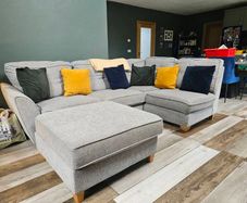 Corner sofa with chaise footstool