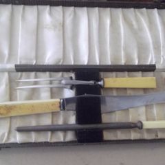 a antique carving knife set in it case