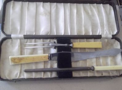 a antique carving knife set in it case