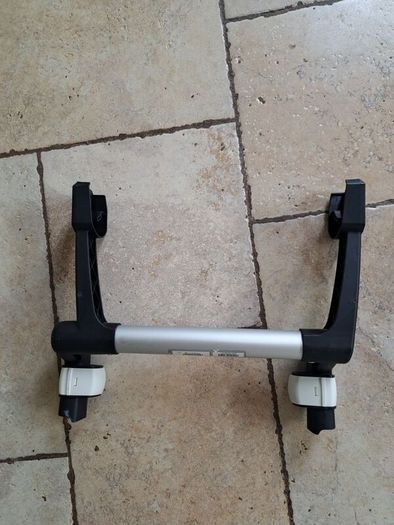 Bugaboo adapter for carseat. Attach carseat to buggy for easy transport from car.
