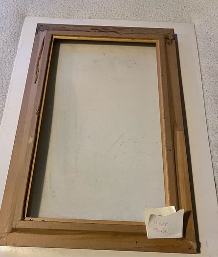 frame A rich dark-wood and gilt picture frame featuring a textured fabric mat liner.