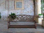 Outdoor hanging bench made of metal