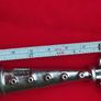 A collectible knife made of polished pewter with a stainless steel blade from Carrol Boyes. Image 6