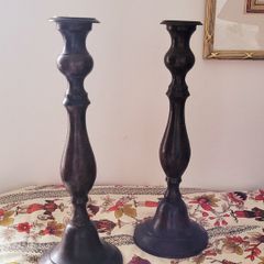 Antique pair of cast candlesticks