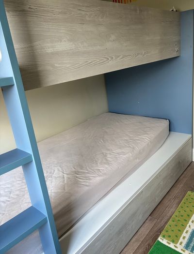 Kids bunk bed with storage